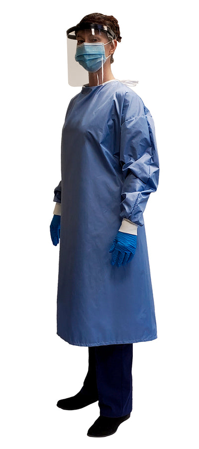 Woman wearing a Fast Reusable Isolation Gown4000 Level 2 made with anti-static blue polyester material. Canadian Made. Profile view.