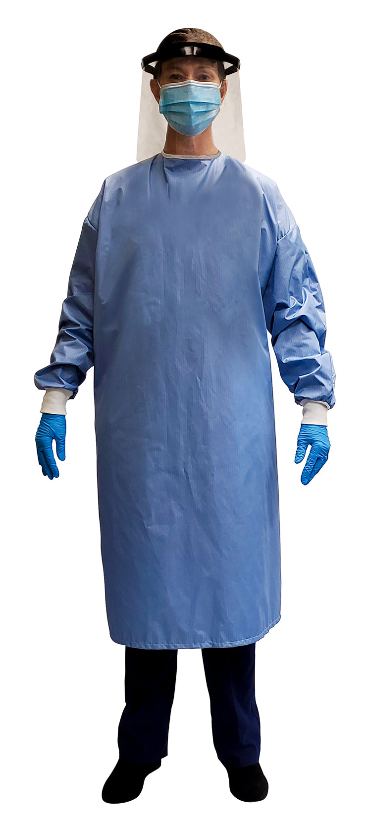 Woman wearing a Fast Reusable Isolation Gown4000 Level 2 made with anti-static blue polyester material. Canadian Made. Front view.