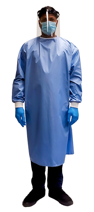 Man wearing a Fast Reusable Isolation Gown4000 Level 2 made with anti-static blue polyester material. Canadian Made. Front view.